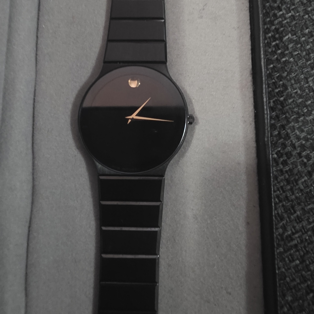 Movado Black and Gold Watch